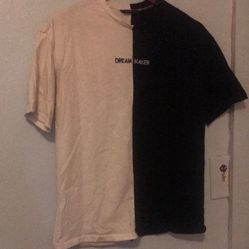 Brand name (Shein) tee shirt. Loose fit but small.